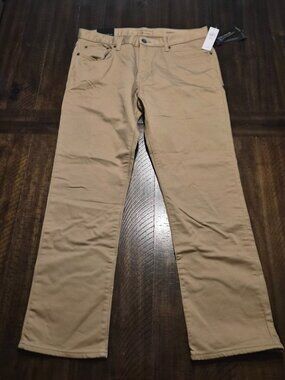 Banana Republic Factory Men’s Slim Fit Beige Travel Jean Size 33x30 NWT H052